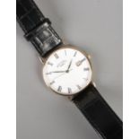 A gents 9ct gold Rotary quartz wristwatch with leather strap. Not running.