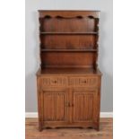 A mid 20th century oak dresser. Hx178cm Wx95cm Dx44cm