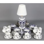 A collection of mostly unfinished Imari pattern ceramics. Includes table lamp, cups & saucers,