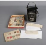 A Lubitel 2 TLR camera with T-22 f/4.5 75mm lens and carry case along with small collection of world