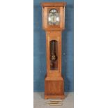 A modern carved oak longcase clock. With floral decoration. (202cm x 45cm x 27cm)