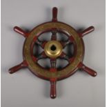 A brass mounted six spoke boat wheel. Approx. diameter 41cm.
