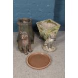 A quantity of concrete garden ornaments. Including small chimney, cat and dog figures etc.