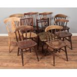 An assortment of ten chairs, to include farmhouse style and turned spindle back examples.