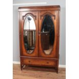 1930's oak wardrobe with mirrored double doors. Approx. dimensions 120cm x 197cm x 44cm.