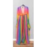 A 1960's John Bates for Jean Varon rainbow coloured dress. Featuring empire waistline, pleated