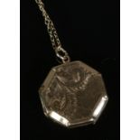 A 9ct gold octagonal locket and chain. 3.2g.