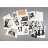 A large quantity of signed photos and autographs of music, film and television interest to include
