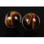 A pair of 9ct gold earrings set with large Tiger's Eye stones. Total weight 4.5g