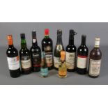 A collection of vintage alcohol including English Mead, Manor Hall fortified wine, Tawny Port and