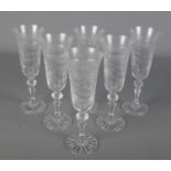 A set of six Veritable Cristal Taille Main champagne flutes.