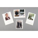 A collection of four signed pictures of television figures including Sir David Attenborough, Richard