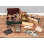 A box of assorted items, to include Acme Boy Scouts whistle, stamp collection, Action Men