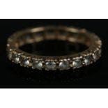 A 9ct gold synthetic spinel eternity ring. Size M, 1.9g.