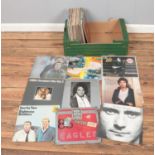 A collection of assorted vinyl records of mainly pop and rock to include The Who, Abba, Bruce