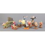 Ten boxed Snow White figurines, from the Walt Disney Classics Collection, together with 'On With The