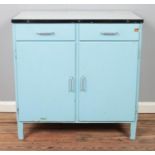 A vintage kitchen unit with enamel top and two drawers over two doors. Hx87cm Wx87cm Dx53cm
