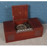 A HMV stereogram in a mahogany cabinet with a Garrard 3000 turntable. Cabinet does not have its