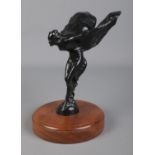 A Rolls Royce Spirit of Ecstasy car mascot signed C. Sykes to base and mounted on walnut base.