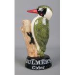 A Carlton Ware ceramic advertising display of a woodpecker; for Bulmer's Cider. 20cm tall. Crazed