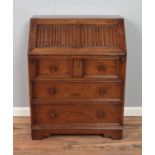 A mid 20th century oak bureau. Hx100cm Wx77cm Dx44cm