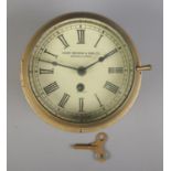 A Henry Browne & Son Ltd (Barking & London) Sestral bulkhead clock, with Roman Numeral dial. Key