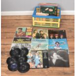 A box of assorted vinyl records and singles to of mainly pop to include The Beach Boys, Diana