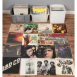Three boxes of LP records. Includes Genesis, U2, Beach Boys, etc.