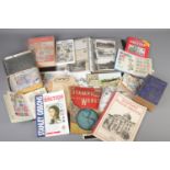 A collection of stamps, postcards and stamp books. Includes Stanley Gibbons Stamps of the World book