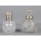 A silver topped globular hobnail cut scent bottle, together with a similar silver collared