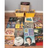 Three boxes of LP and single records. Includes Fleetwood Mac, Bee Gees, Tom Jones, Slayed,