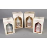 A set of four Bell's whisky decanters to commemorate, birth of Prince William of Wales 21st.June
