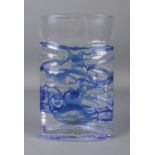 A Dartington art glass vase, of oval insert form with blue threaded decoration. Bears Dartington