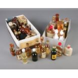 Two boxes of alcohol miniatures including Gordon's, Bushmills, Glayva, Glengoyne, Teachers, Glen