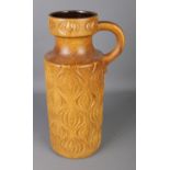 A West German handled vase with brown glaze. Approx. height 46cm.
