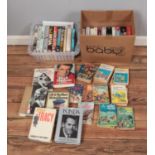 Two boxes of film autobiographies/biographies along with small selection of Enid Blyton novels. To
