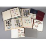 A quantity of albums of stamps. Includes Penny reds, mint examples, etc.