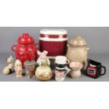 A box of ceramics. Includes two West German Rumtoft pots, Wade pig, Sylvac, Vitreous China spirit