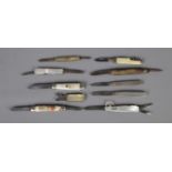 A collection of ten folding fruit knives including mother of pearl and commemorative examples.