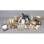 A box of assorted ceramics to include Blue Mountain wolf, Hornsea fauna, Country Arts, etc.