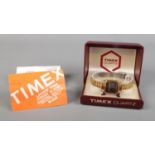 A ladies Timex quartz dress alarm digital wristwatch, in box with booklet.