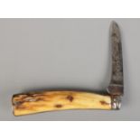 A Saynor pruning knife with horn handle. Blade length 8cm. CANNOT POST OVERSEAS.