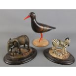 Three Feather Wildlife 'Feathers of Knysha' figures. Includes Elephants, African Black Oyster