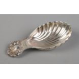 An A Marston & Co Birmingham silver caddy spoon in the form of a seashell. Hallmarked date