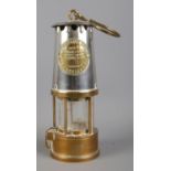 An Eccles 'Type 6' Miner's Safety Lamp; by The Protector Lamp and Lighting Co. Ltd.