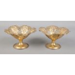 A pair of sterling silver gilt sweetmeat dishes with pierced decoration. Stamped B.B & B.Co to