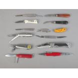 A collection of multi and single bladed folding pen knives to include Swiss Victorinox, Satchwell