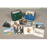 A collection of LP records in two travel cases including The Beatles, Quick Silver, The Clash,