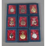 Nine boxed quartz pocket watches including horses, dragon and roman numeral dial examples.