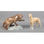 A Beswick model of a Greyhound, titled 'CH Jovial Roger', together with a Beswick puma (No. 1823).